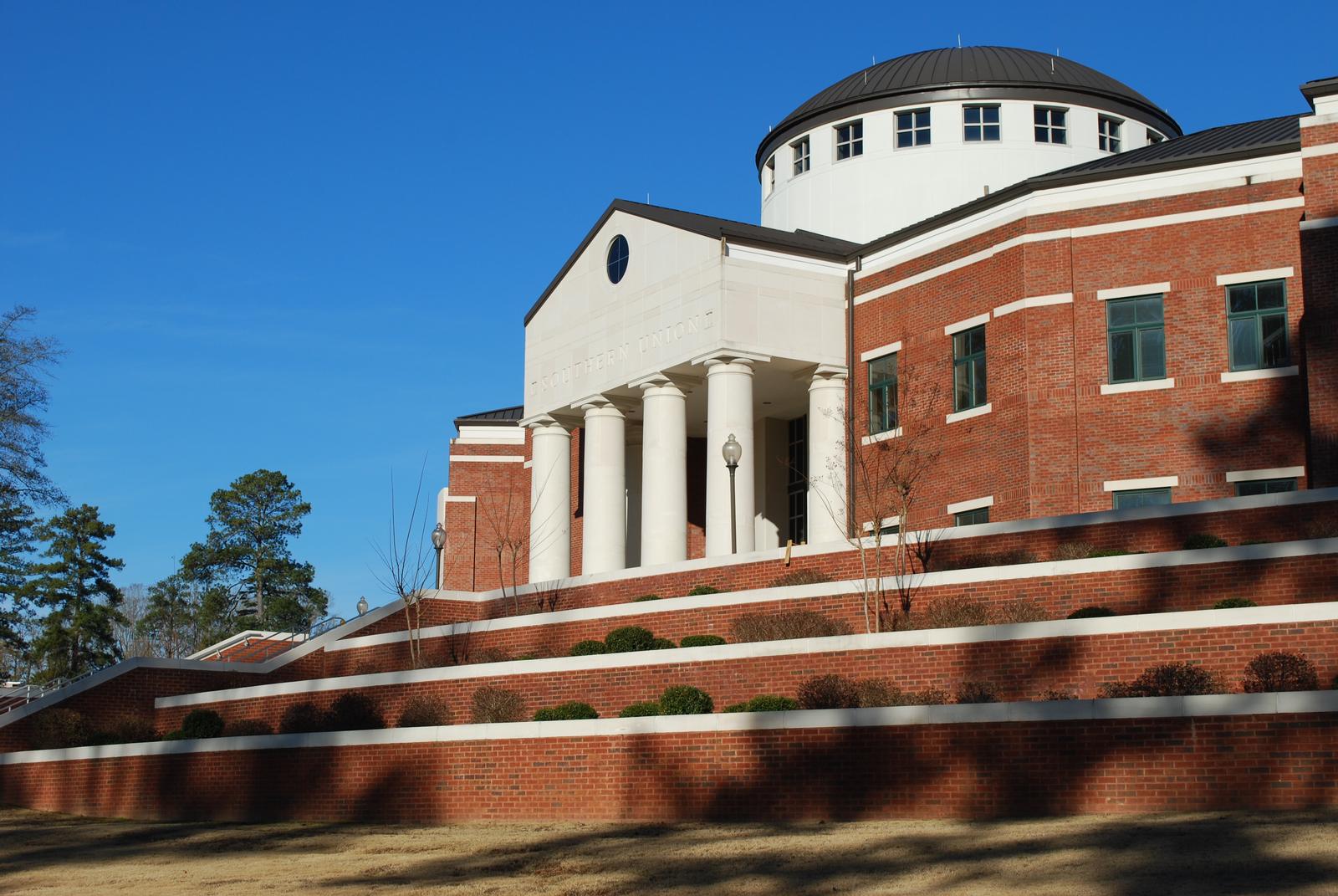 An SUSCC building with shrubbery planted on terraces